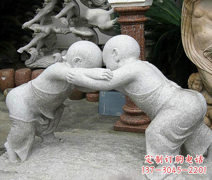 江西可爱小孩摔跤石雕