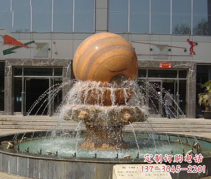 江西石来运转球晚霞红风水球石雕