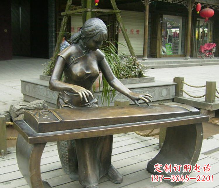 江西铜雕现代人物弹古筝雕塑