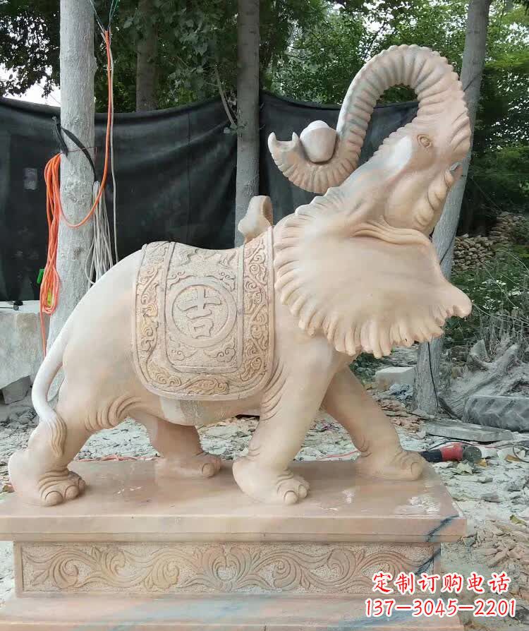 江西晚霞红卷元宝大象雕塑