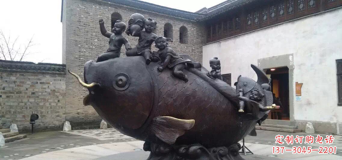 江西小孩骑鱼铜雕